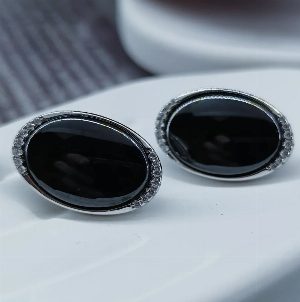 Серебряные серьги с вставками из керамики и цирконов