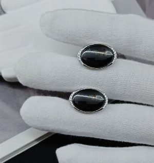 Серебряные серьги с вставками из керамики и цирконов