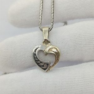 Серебряная миниатюрная подвеска "Сердце". Северная чернь